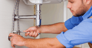 Licensed and trusted Las Vegas plumber from Fast Plumbing performing professional sink leak repair for residential plumbing service.